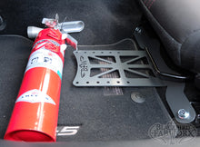 Load image into Gallery viewer, Blackbird Fabworx Fire Extinguisher Bracket - ND Miata (16-up) / Fiat 124 Spider (17-up)